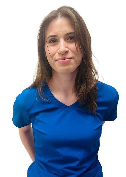 Emilee - Female CSR with medium length brown hair wearing royal blue scrubs